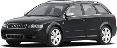 Black sporty wagon with alloy wheels and roof rails, front-side view