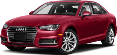 Red sedan with front grille, angular headlights, and alloy wheels.