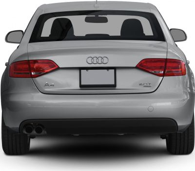 Rear view showing taillights, badge, and dual exhausts