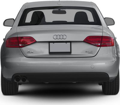 Rear taillights and dual exhaust of a sedan
