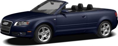 Front-side view of a dark blue convertible with folded soft top and 5-spoke wheels