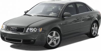 Front side view of a sedan with alloy wheels.