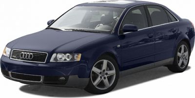 Front-side view of a sedan with distinctive headlights and alloy wheels