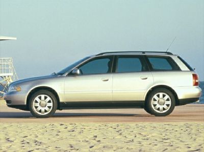 Silver 1999 estate wagon side profile with alloy wheels