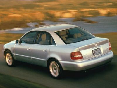 Silver sedan rear view with updated taillights and smooth body lines