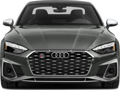 Hexagonal grille and sharp LED headlights on a sleek coupe front