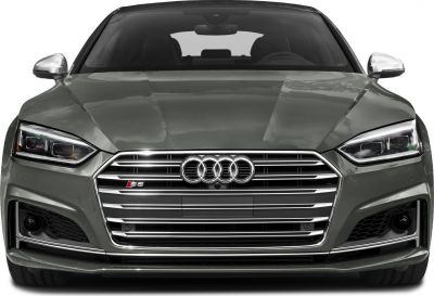 Front view with grille, headlights, and chrome accents