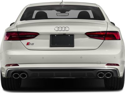 White coupe rear view, quad exhausts, LED taillights