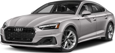 Front angle with hexagonal honeycomb grille and LED headlights.