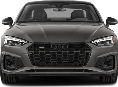 Aggressive front view with hex honeycomb grille and LED headlights