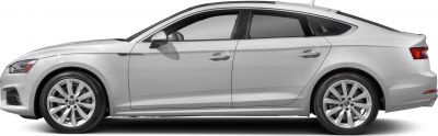 Side profile of silver mid-size sedan with alloy wheels and tinted windows