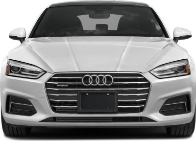Front view with grille and headlights in sharp focus