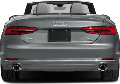Rear view of convertible with taillights, badges, and dual exhaust