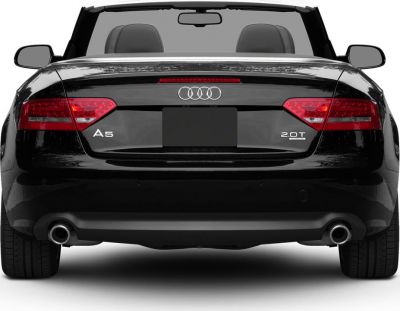 Rear view of convertible with dual exhausts and 2.0T badge