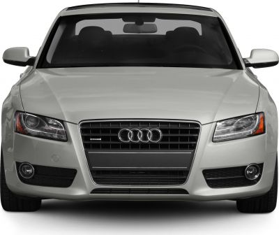 Front view featuring grille, headlights, and fog lamps.