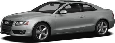 Side profile with alloy wheels of a sleek coupe