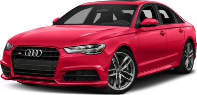 Red car sedan with bold grille and alloy wheels