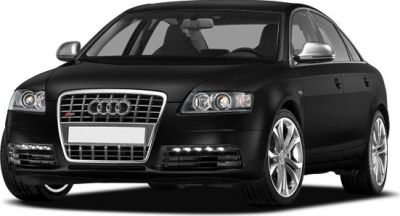 Front view of black sedan with grille and LED daytime running lights