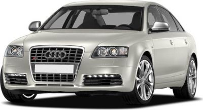 Front view of a luxury sedan with distinctive grille and alloy wheels