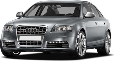 Front view of a sporty sedan with distinctive grille and LED headlights