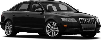 Black sedan with V10 badge, alloy wheels, and distinctive front grille.