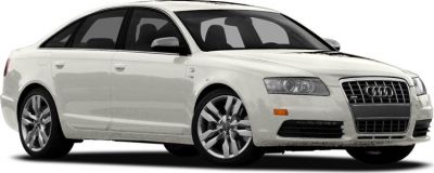 White sedan with distinctive front grille and alloy wheels