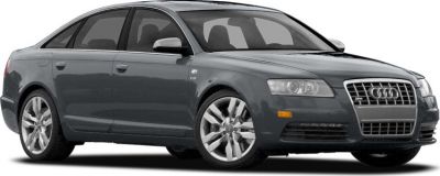 Front side view of a sleek sedan with alloy wheels