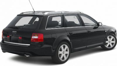 Rear three-quarter view of a station wagon with dual exhausts and taillights