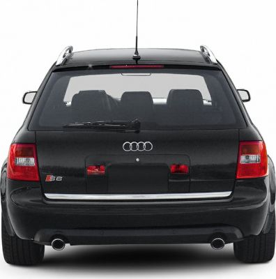 Rear view with tail lights, dual exhaust, and roof rails of a station wagon