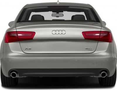 Rear view with taillights, badges, dual exhaust, and rear window