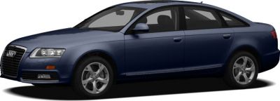 Side profile and alloy wheels of a blue sedan