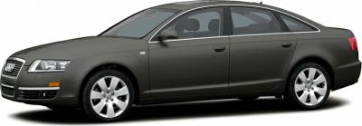 Side profile of a sedan with alloy wheels and streamlined shape