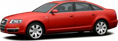 Red mid-size sedan with chrome grille and alloy wheels.