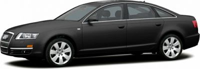 Black sedan with alloy wheels and prominent front grille from side view