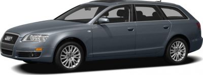 Side profile of a mid-size station wagon with alloy wheels and roof rails.
