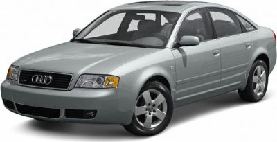 Silver sedan front side view with facelift headlights and grille