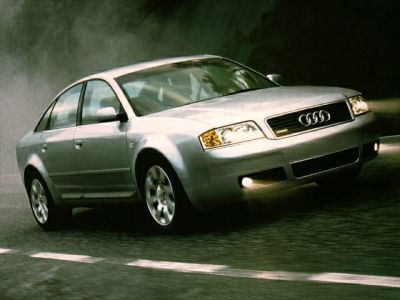 Silver sedan with fog lights and alloy wheels
