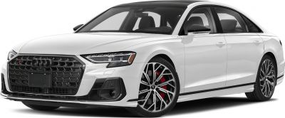 Aggressive hexagonal grille and multi-spoke alloy wheels with red brake calipers