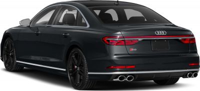 Rear view with LED taillights, quad exhaust tips, dark luxury sedan.