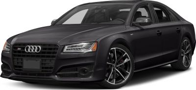 Luxury sedan with LED headlights and V8T engine badge.