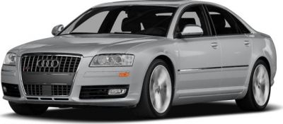 Silver luxury sedan with distinctive front grille and alloy wheels.