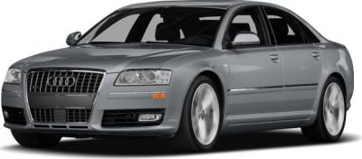 Front-side view of silver luxury performance sedan with grille and wheels visible