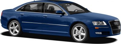 Front-side view of luxury sedan with distinctive grille and alloy wheels.