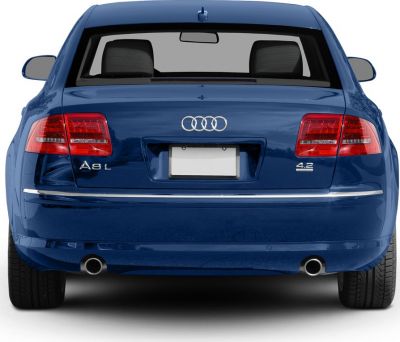 Rear view showing taillights, twin exhaust, and 4.2 badge