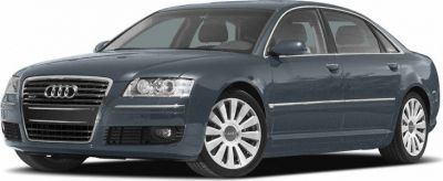 Luxury sedan front-side view with signature grille and LED headlights