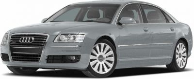 Luxury sedan front view with a distinctive grille and alloy wheels