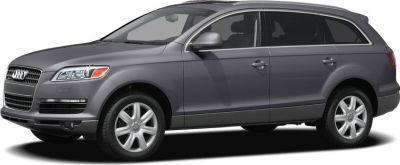 Front side view of a luxury SUV with alloy wheels and distinct body contours