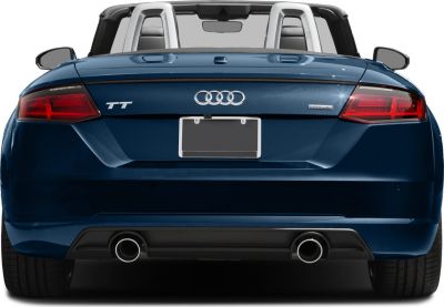 Rear view of convertible with dual exhausts and sporty taillights