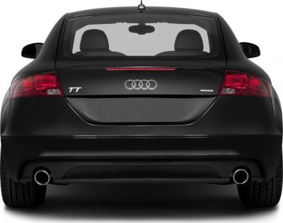 Rear view of sporty coupe with dual exhausts and distinctive taillights