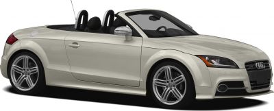 White convertible with sleek side profile and alloy wheels